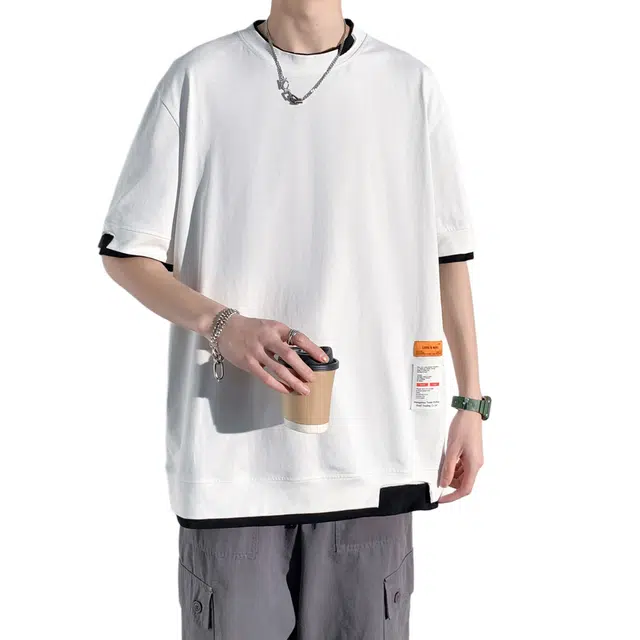 NXNM T