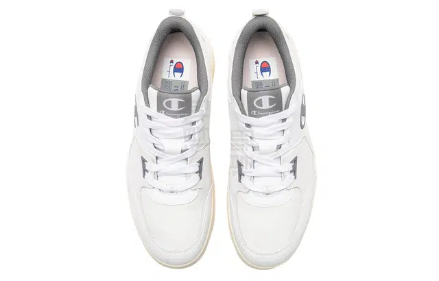 Champion Essentials Dado Trainer Low LOGO