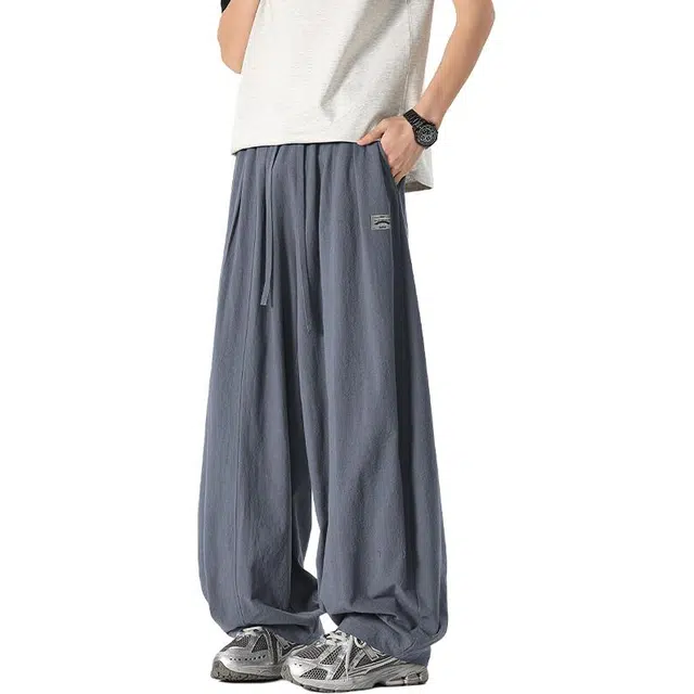 颂希尔 夏季轻薄棉麻贴标大码拖地弯刀裤时尚潮牌宽松休闲裤 男女同款
