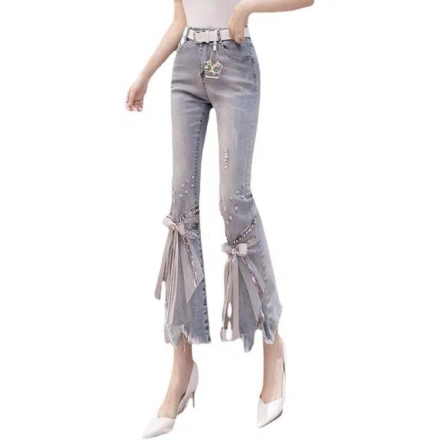 木清清 时尚高腰磨破不规则喇叭裤牛仔裤 女款