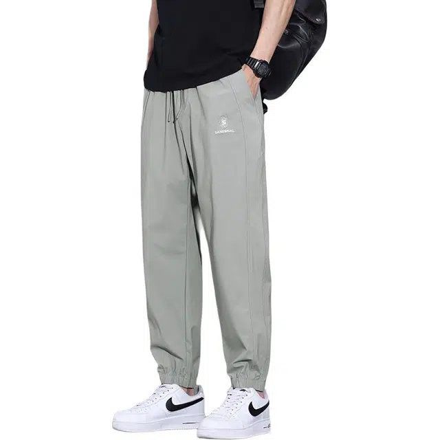 协协乐 夏季薄款冰丝凉感透气速干美式潮牌韩版哈伦束脚百搭宽松通勤中腰九分裤休闲裤 男款