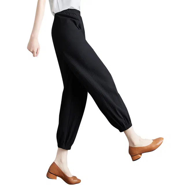 她池 松紧腰宽松显瘦黑色束脚裤子九分休闲裤 女款