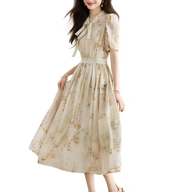 曲韩 法式蝴蝶结碎花收腰中长裙子气质绝美印花夏季短袖连衣裙 女款 黄色