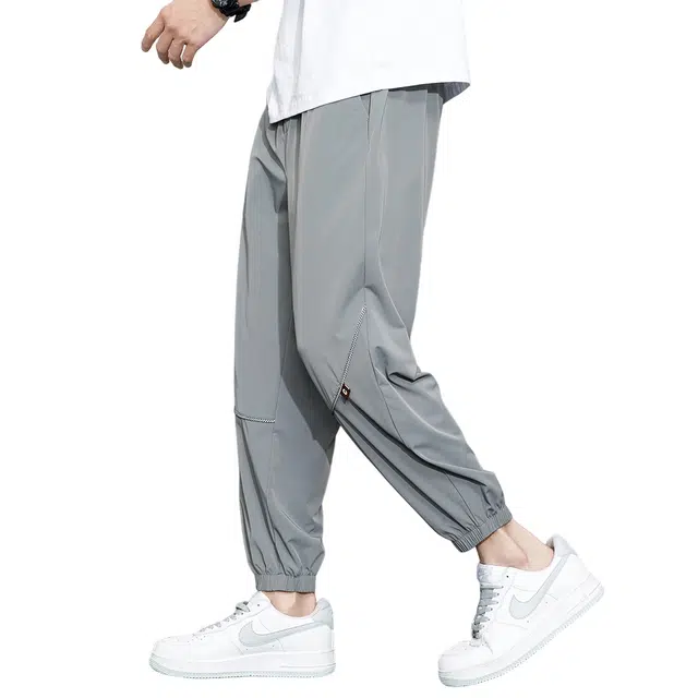 顶峰保罗 无性别主义冰丝潮牌薄款亲肤宽松加大码透气速干束脚九分哈伦运动时尚百搭休闲裤 男女同款