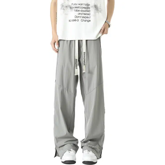 敦煌博物馆 美式高街纯色侧边拉链透气网孔户外运动速干薄款冰丝凉感宽松大码舒适百搭直筒系带休闲裤 男女同款