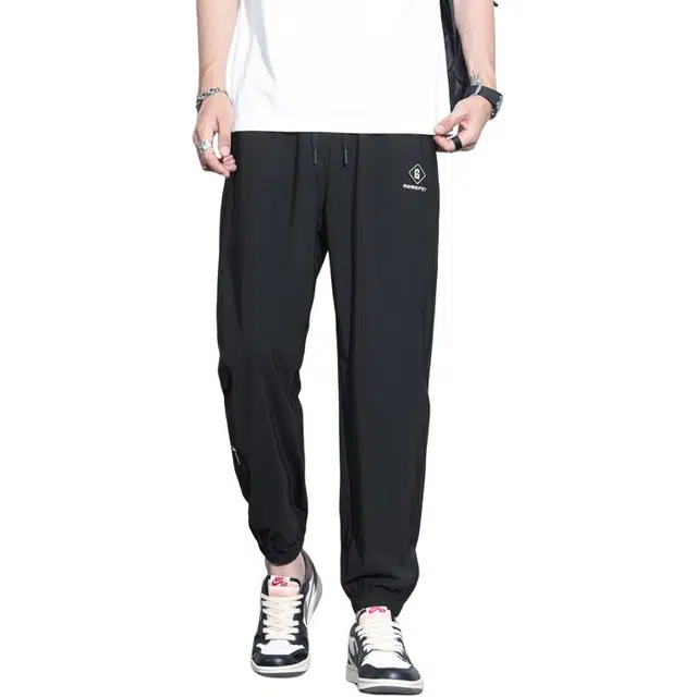 协协乐 高街风纯色高弹冰丝凉感透气薄款美式潮牌运动速干束脚九分休闲裤 男款