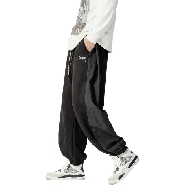 敦煌博物馆 美式复古麂皮绒宽松同色拼插梭织束脚针织休闲裤 男女同款