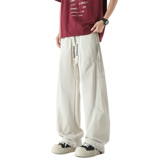 敦煌博物馆 美式学院风潮流拖地百搭舒适透气大码弯刀裤抽绳系带宽松多口袋裁剪拼接明线垂感休闲裤 男女同款