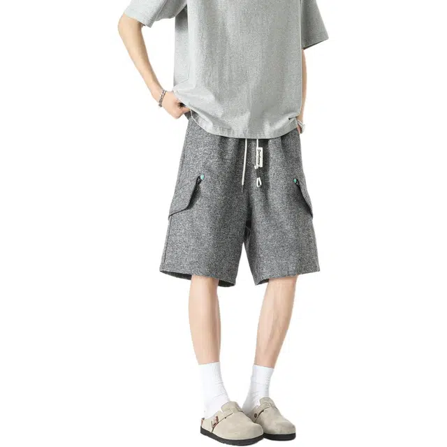 敦煌博物馆 美式复古老钱风仿麻面料猫眼绿宝石装饰纽扣简约宽松百搭休闲短裤 男女同款