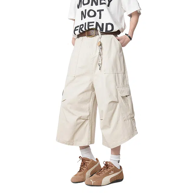 哲源 复古潮流时尚纯色侧边口袋简约日常通勤不规则设计宽松百搭休闲透气户外纯棉阔脚七分工装短裤 男女同款