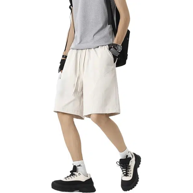 黑马漫画 美式斜切速干薄款篮球运动宽松休闲短裤 男女同款