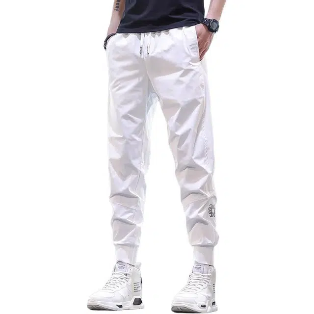 潮人榜 美式潮牌薄款透气高级感束脚运动裤潮流百搭高端速干九分休闲裤 男款