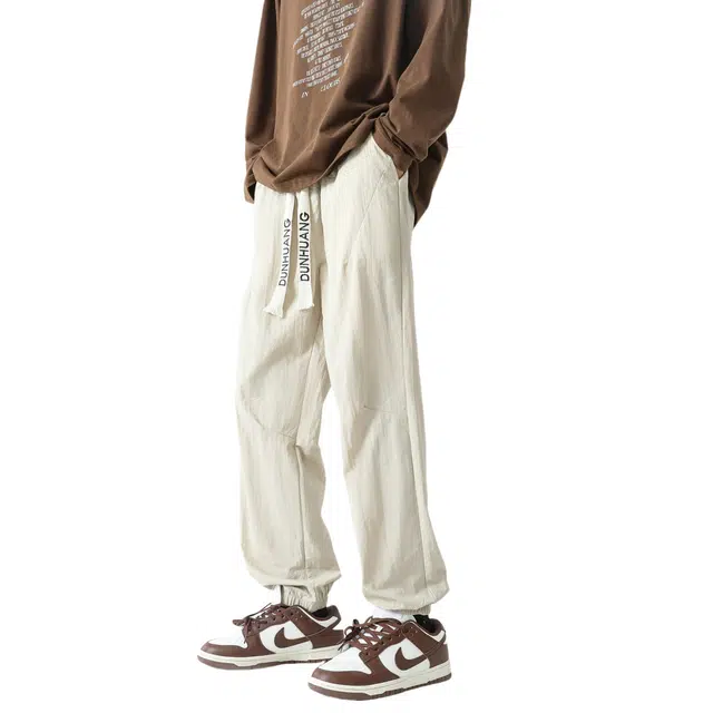 敦煌博物馆 美式高街潮牌轻薄纯色基础款冰丝凉感速干简约宽松九分束脚系带百搭休闲裤 男女同款