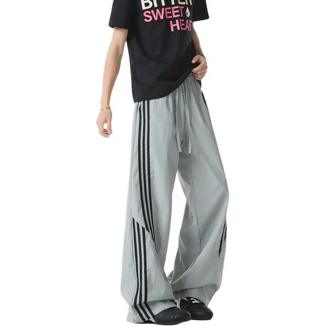 颂希尔 时尚潮流不规则条纹设计宽松透气百搭舒适个性帅气休闲裤 男女同款