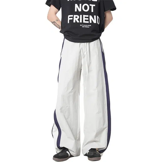 帝狼牛 美式复古高街冰丝速干侧边拉链撞色拼色条纹直筒运动伞兵休闲裤 男女同款