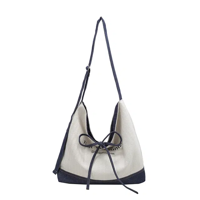 笛贝嘉 森系百搭小众设计感托特包休闲通勤字母 帆布 单肩包 女款 白蓝色