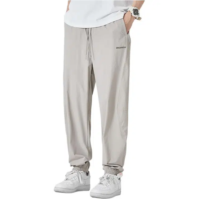 潮人榜 美式高街拼接小众设计感百搭潮牌松紧腰抽绳束脚裤宽松时尚运动弯刀裤工装休闲裤 男款