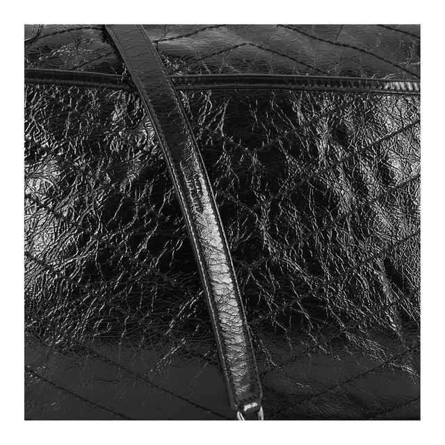 SAINT LAURENT YSL Niki Logo