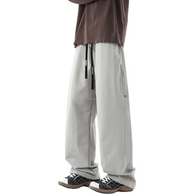敦煌博物馆 美式高街纯色简约基础宽松阔腿弯刀垂感显高金属拉链抽绳设计百搭运动通勤休闲裤 男女同款