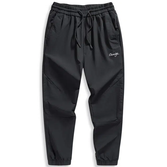 与狼共舞 高弹力锦氨面料潮流街头风时尚通勤百搭纯色简约松紧腰锥形束脚休闲裤 男款