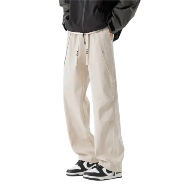 半空山 美式复古高街纯色简约立体线条解构拼接褶皱设计潮流时尚脚口抽绳调节宽松百搭休闲裤 男女同款