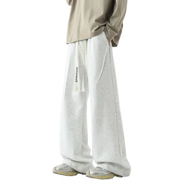 敦煌博物馆 美式高街复古纯色简约线条分割学院风日常通勤运动抽绳系带宽松舒适百搭阔腿拖地休闲裤 男女同款