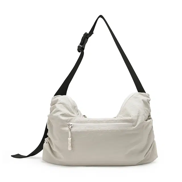 德力熊 百搭褶皱抽绳云朵斜挎包小众设计通勤包 尼龙 单肩包 常规 女款 多色