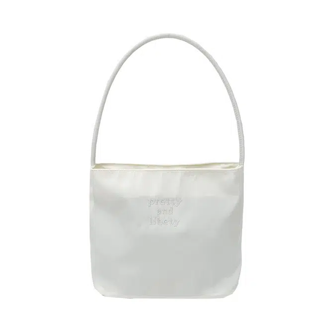 简应舒尼龙防水刺绣手提包挎下化妆包洗漱包 便携单层收纳防摔防泼水