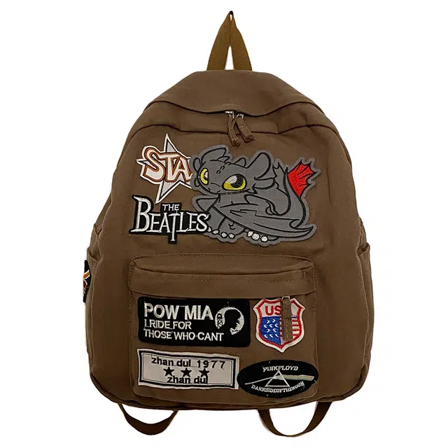 單倉 卡通潮流个性设计学院风轻便耐磨 帆布 书包背包双肩包 男女同款情侣款 棕色