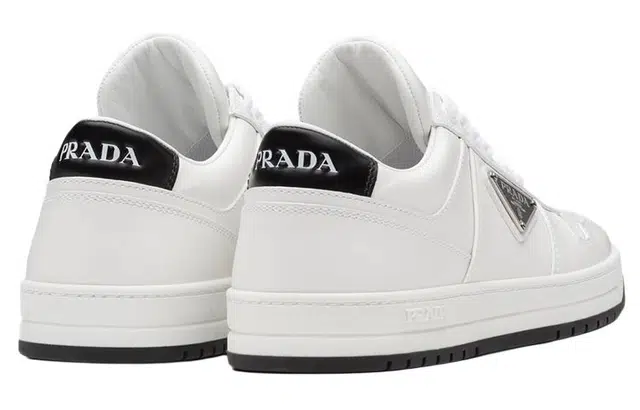 PRADA Prada Downtown logo