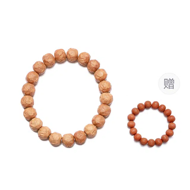 梨云暮雪 太行山优品 原籽精雕龙蛇之变  颜色深度适中 手感一级  盘玩出油快 精细抛光  原皮 猴头核桃 手串 男女同款情侣款