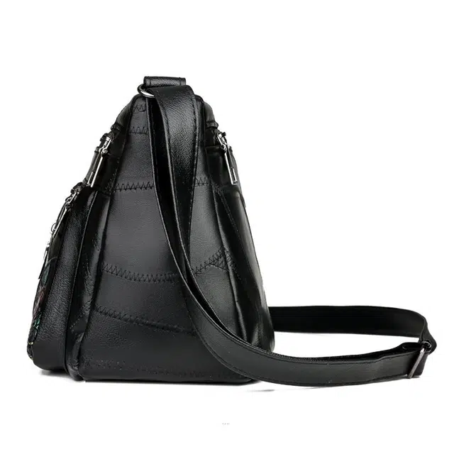 米囹 出行个性 简单舒适 皮质亲肤耐磨 通勤优雅男女同款 轻盈 斜跨包 小号 黑色