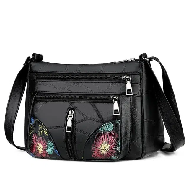 米囹 出行个性 简单舒适 皮质亲肤耐磨 通勤优雅男女同款 轻盈 斜跨包 小号 黑色