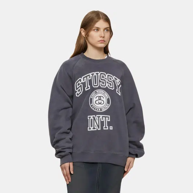 Stussy FW24 OVERLOCK VARSITY RAGLAN CREW logo