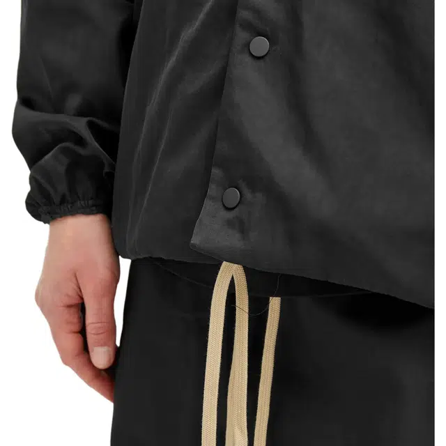 Fear of God Essentials Fall24 BACK TO SCHOOL Textured Nylon Hooded Coaches Jacket Logo BLACK