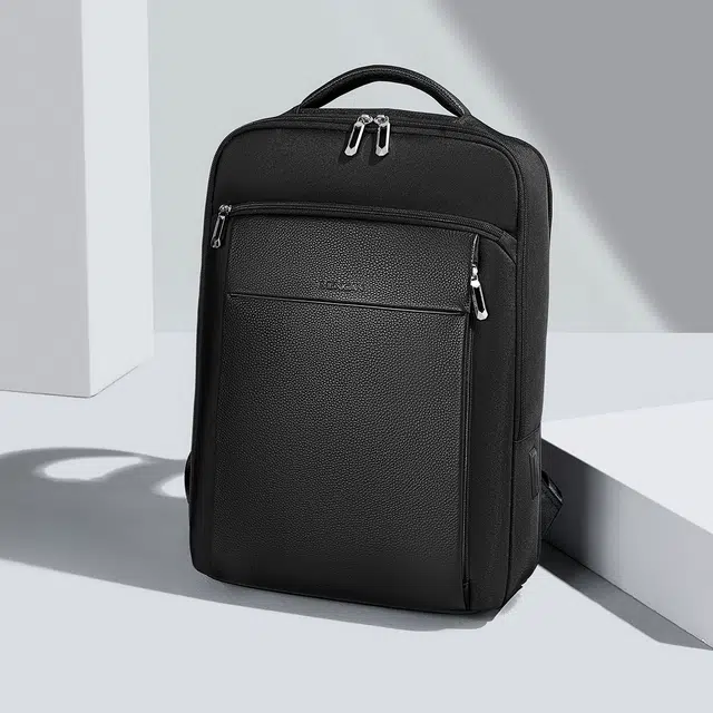 稻草人 轻便出行大容量商务多口袋电脑背包 牛皮 双肩包 常规 男款 黑色