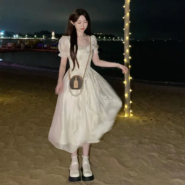 玉儿恋 掌上明珠 法式百搭休闲简约甜美森系仙女荷叶边纯色宽松气质方领收腰温柔仙女中长款长袖连衣裙 女款 杏色