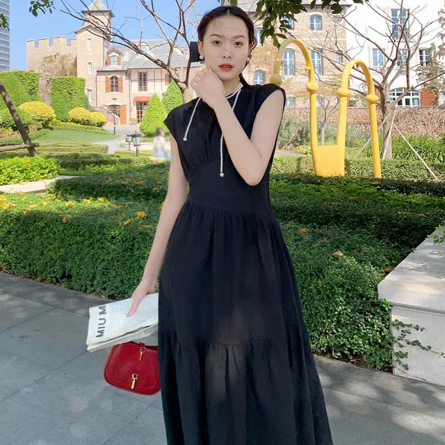 美洋柑橘气泡连衣裙 纯色高腰编织肌理浪漫圆领无袖中长款背心裙