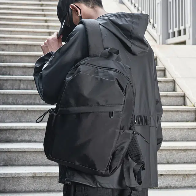 木村耀司 潮流百搭大容量大学生通勤休闲运动多口袋 牛津纺 电脑包旅行包书背包双肩包 常规 男女同款情侣款 黑色/迷彩黑