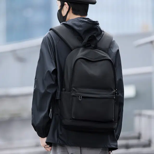木村耀司 潮流百搭大容量大学生通勤休闲运动多口袋 涤纶 电脑包旅行包书背包双肩包 常规 男女同款情侣款 黑色/迷彩黑
