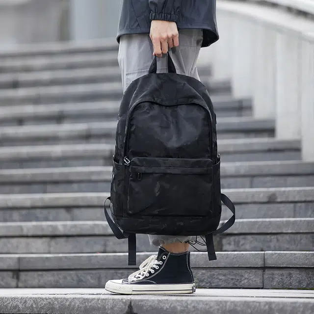 木村耀司 潮流百搭大容量大学生通勤休闲运动多口袋 涤纶 电脑包旅行包书背包双肩包 常规 男女同款情侣款 黑色/迷彩黑