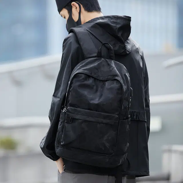 木村耀司 潮流百搭大容量大学生通勤休闲运动多口袋 涤纶 电脑包旅行包书背包双肩包 常规 男女同款情侣款 黑色/迷彩黑
