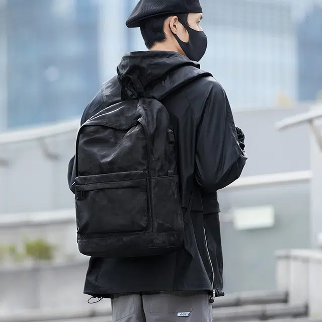 木村耀司 潮流百搭大容量大学生通勤休闲运动多口袋 涤纶 电脑包旅行包书背包双肩包 常规 男女同款情侣款 黑色/迷彩黑