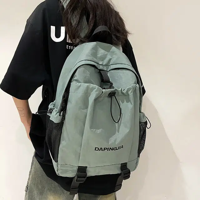 醇龙 户外运动轻便休闲防泼水 尼龙布 双肩包 男女同款情侣款 棕/浅灰/黑/绿