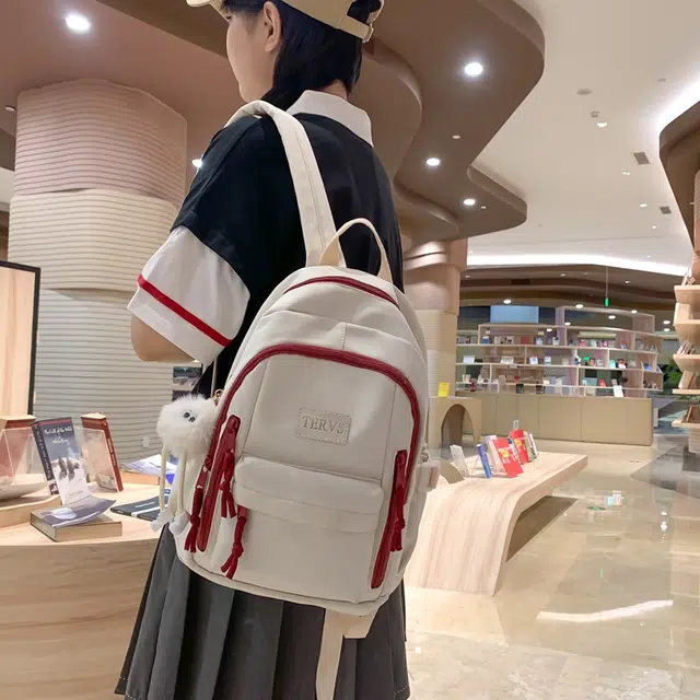 醇龙  尼龙男女通用多色书包大容量学生轻便减负护脊高颜值背包纯色多口袋双肩包