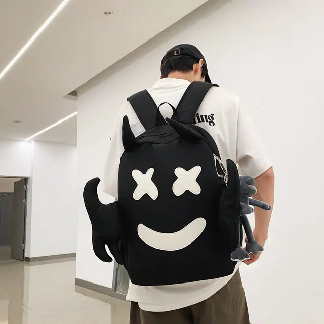 醇龙 可爱搞怪笑脸设计感小众大容量休闲旅行 尼龙 双肩包 常规 男女同款情侣款 黑/白