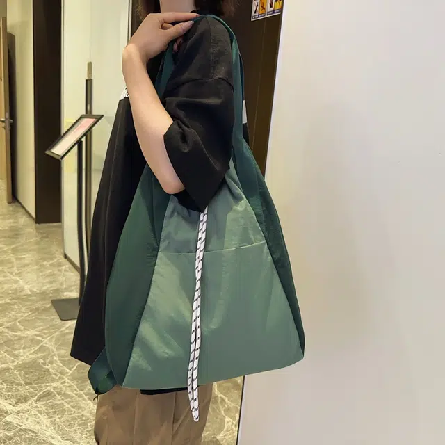 醇龙 抽绳运动防水通勤大容量手提多功能 尼龙 双肩包 男女同款情侣款 多色