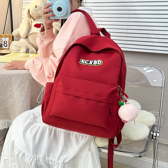 醇龙  尼龙男女通用多色书包学生韩版纯色大容量耐磨双肩包旅行背包