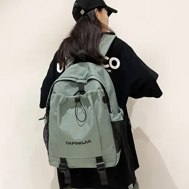 醇龙 户外运动轻便休闲防泼水 尼龙布 双肩包 男女同款情侣款 棕/浅灰/黑/绿