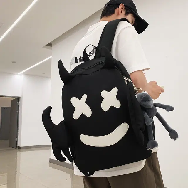 醇龙 可爱搞怪笑脸设计感小众大容量休闲旅行 尼龙 双肩包 常规 男女同款情侣款 黑/白